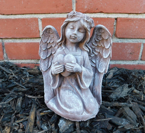 Concrete small heart angel