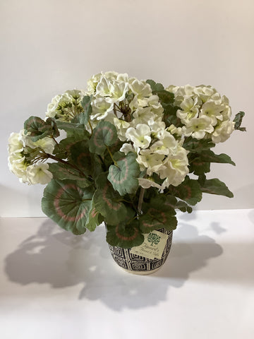 Ceramic planter with arrangement